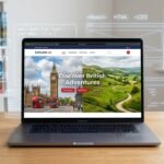 Tourism website development in the UK – developer working on travel site design with London landmarks on screen.